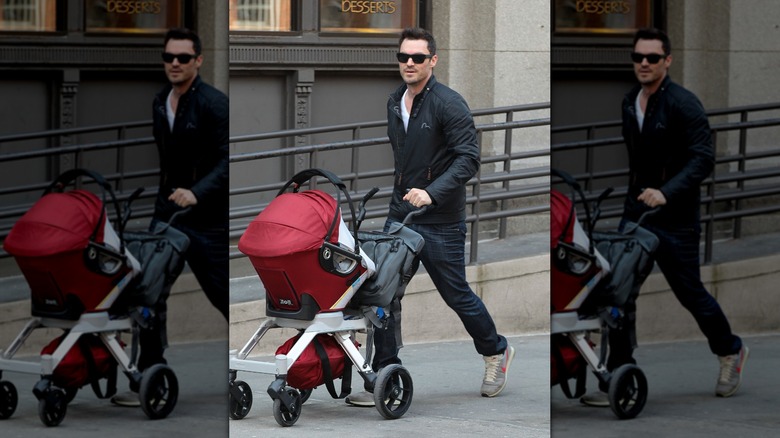 Brian Austin Green pushing a stroller
