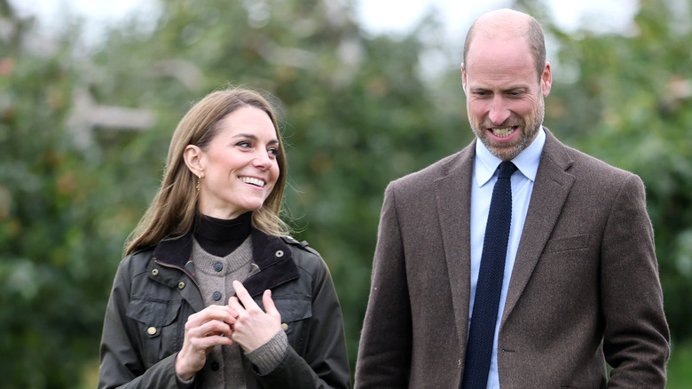 Kate Middleton lovingly looks at Prince William as they walk outside