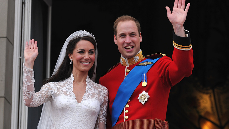 Kate Middleton and Prince William wave to crowds on their wedding day
