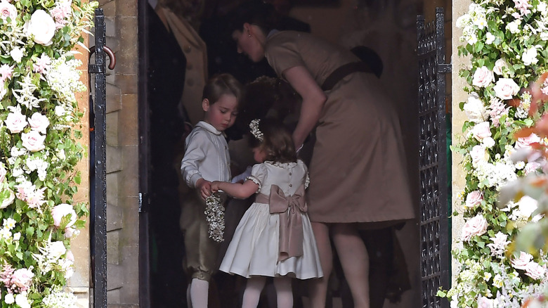Maria Borrallo with Prince George and Princess Charlotte at a wedding