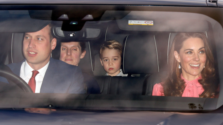 Prince William, Maria Borrallo, Prince George, and Princess Catherine in a car