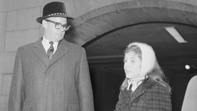A black-and-white photograph of John Ross and Patty Duke