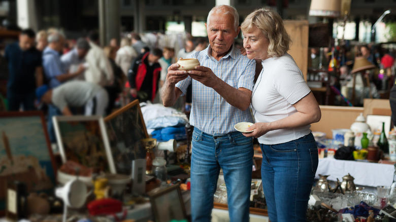 Couple shopping at flea market