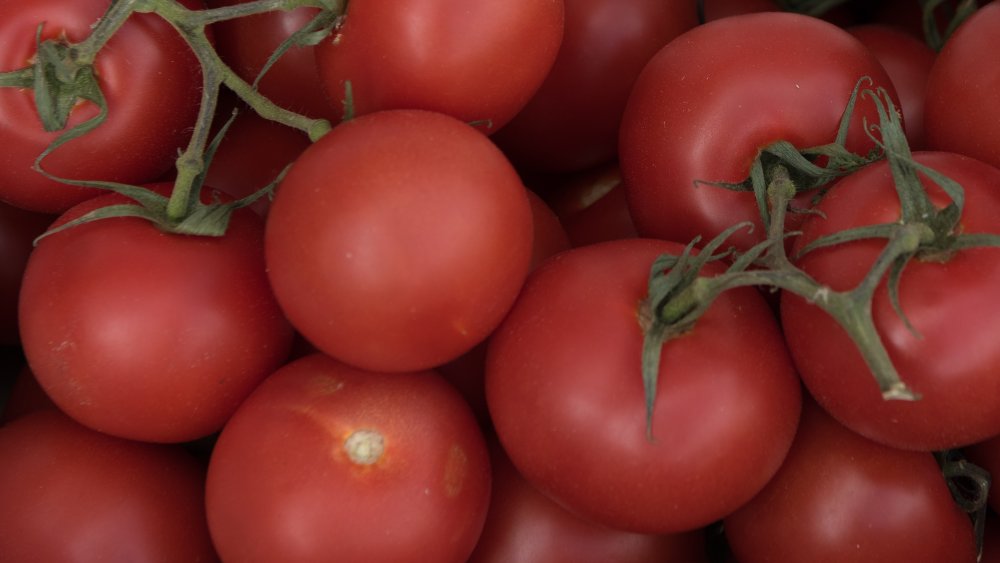 Box of fresh tomatoes