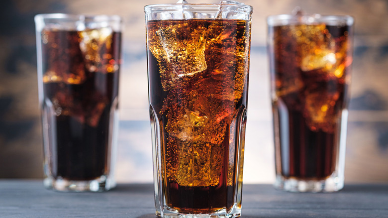 Three glasses of cola