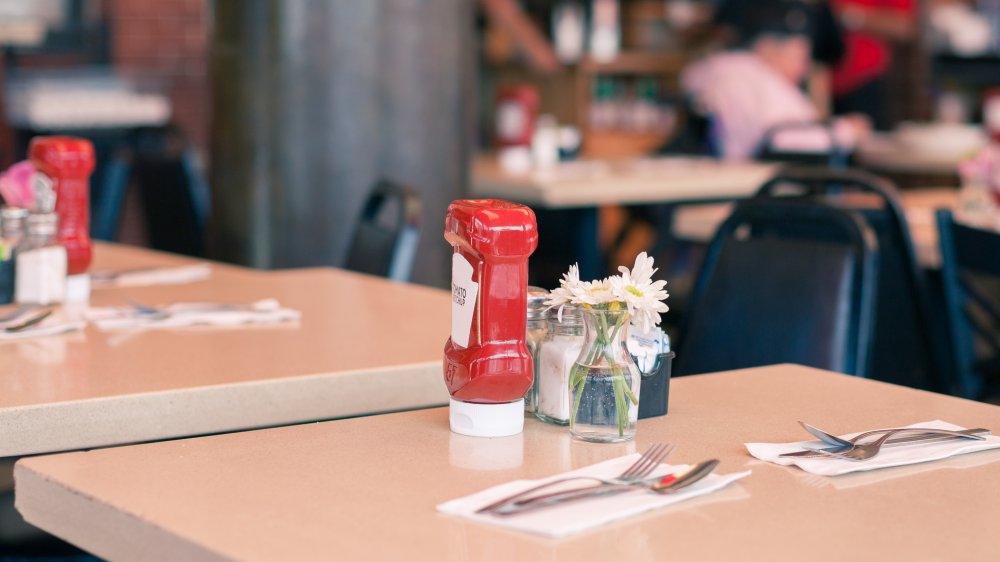 Ketchup bottle on a restaurant table