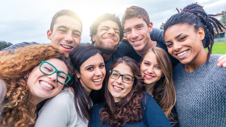 A group of friends smiling for the camera