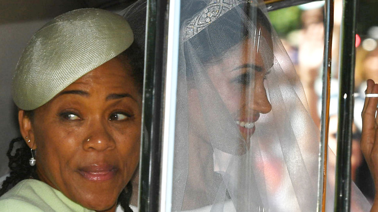 Meghan Markle leaves the Cliveden House Hotel accompanied by her mother, Ms Doria Ragland, ahead of her wedding to Prince Harry, 2018