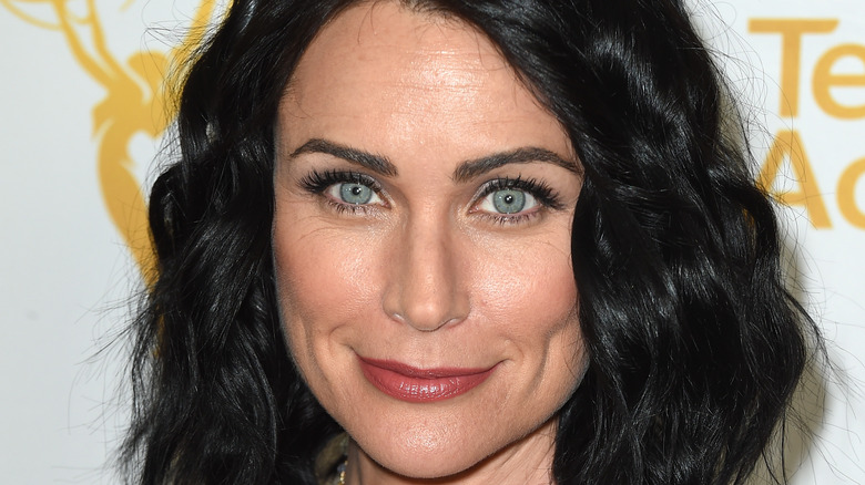 Rena Sofer grinning on the red carpet