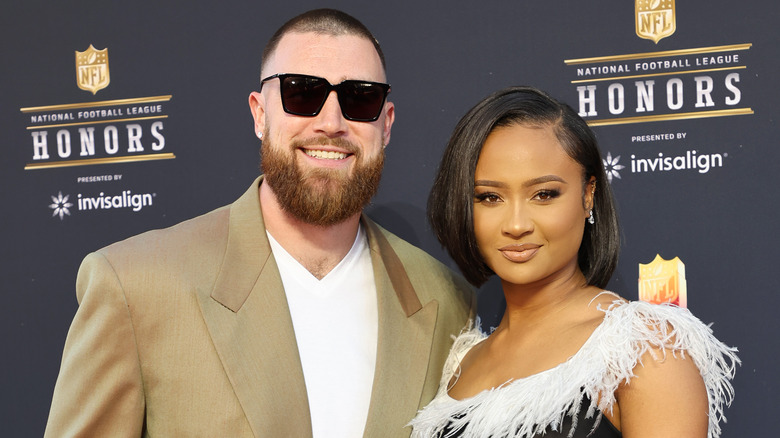 Travis Kelce and Kayla Nicole during their relationship 