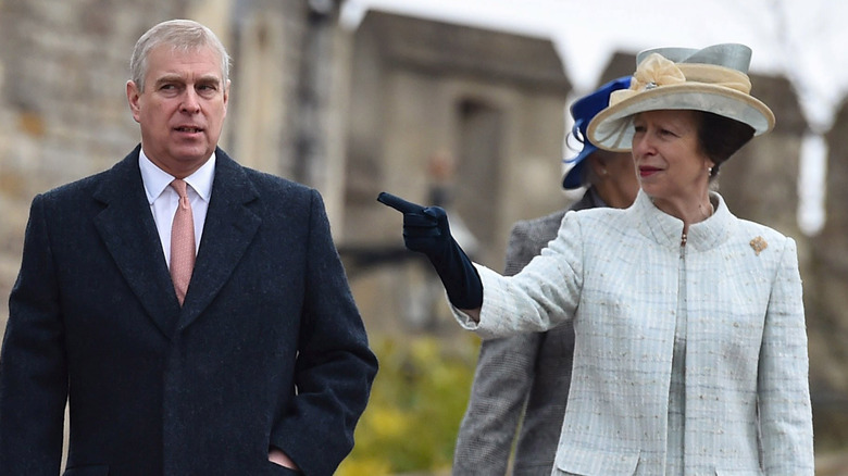 Prince Andrew and Princess Anne walking together