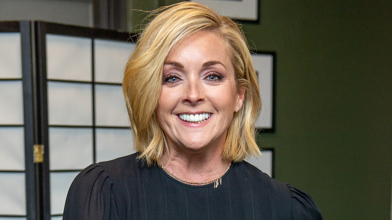 Jane Krakowski wears black dress