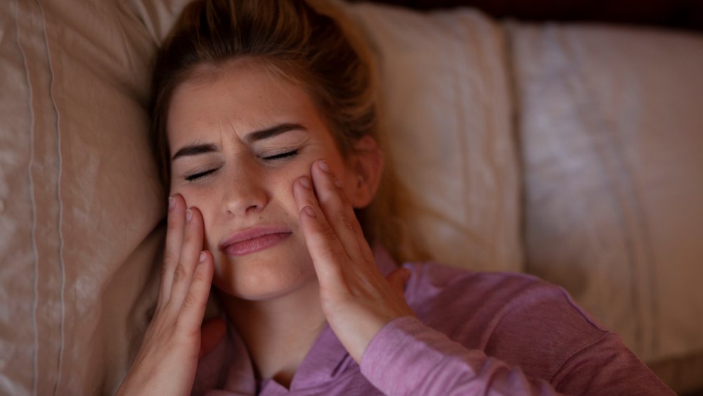 Woman grinding teeth