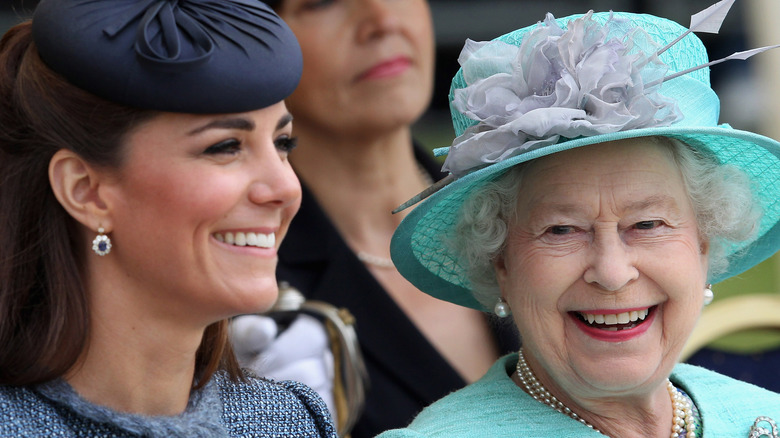 Queen Elizabeth and Kate Middleton share a moment. 