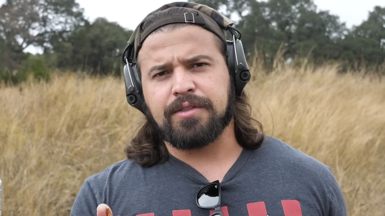 Brandon Herrera wearing ear protection