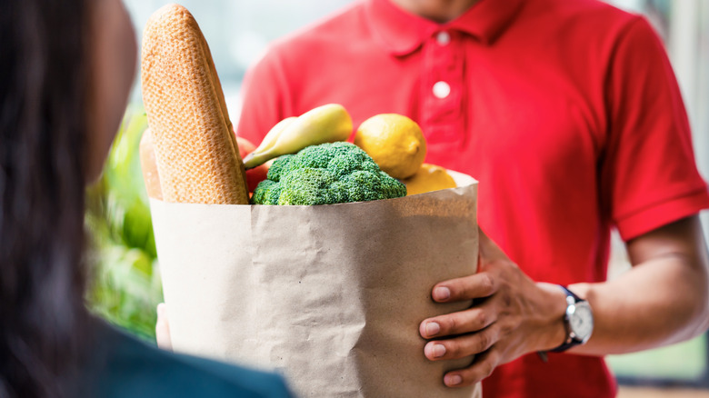 Man holding a grocery bag