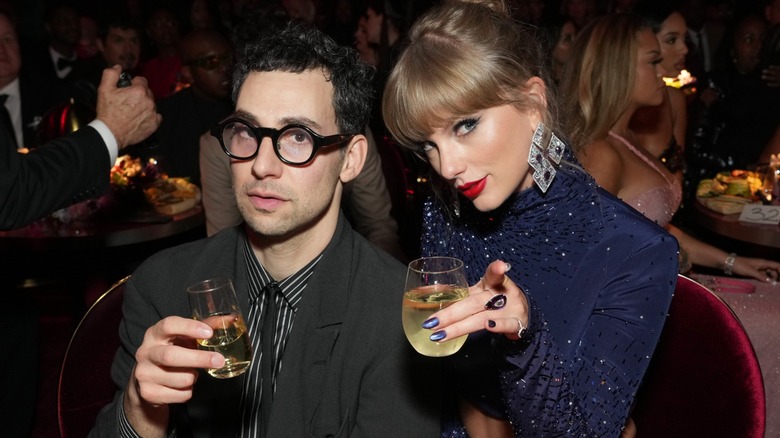 Jack Antonoff Taylor Swift holding drinks