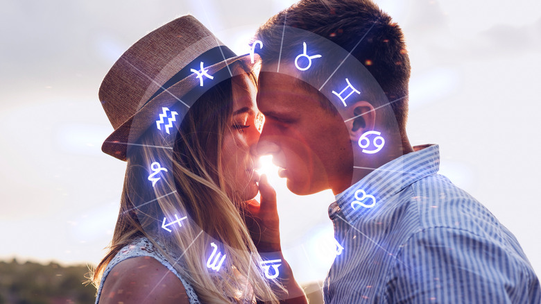 Zodiac love man and woman kissing