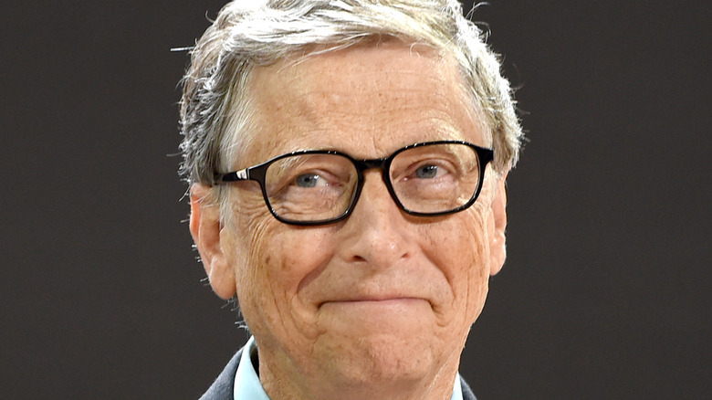 Bill Gates smiles at an event