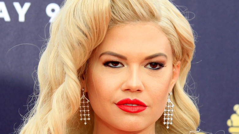 Chanel West Coast posing on red carpet