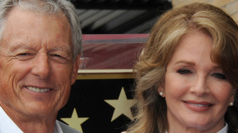 Wayne Northrop and Deidre Hall pose for a photo.