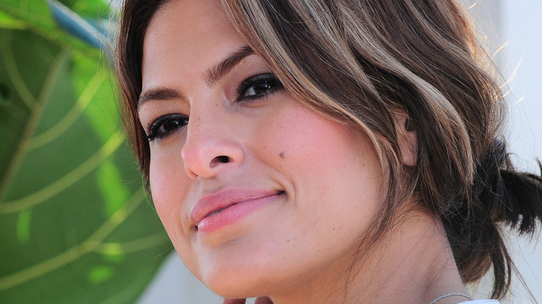 Eva Mendes smiles at camera