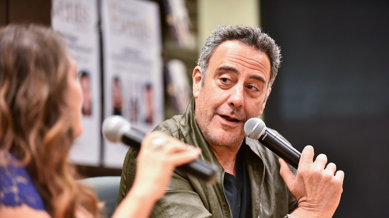 Brad Garrett talking microphone