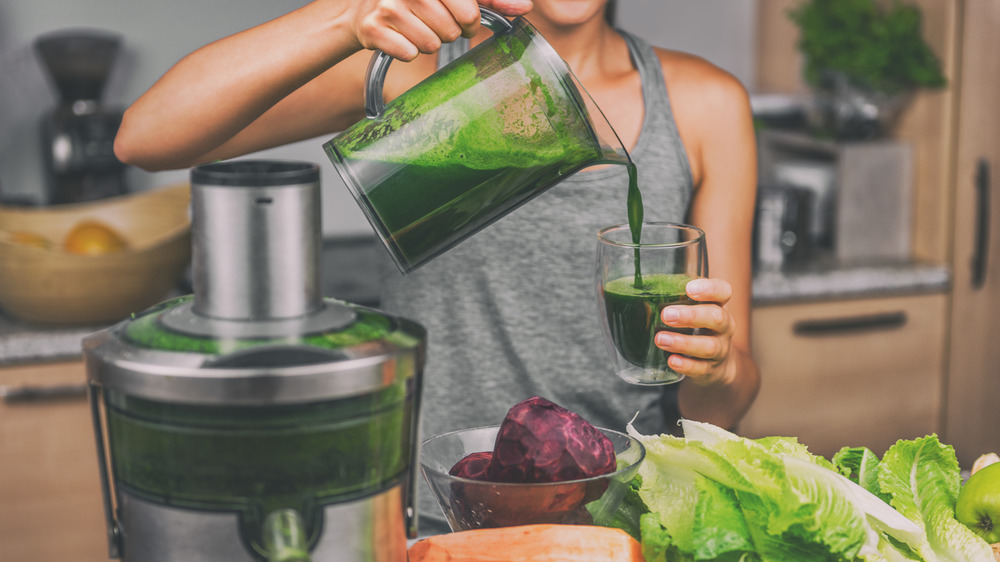 Pouring green juice