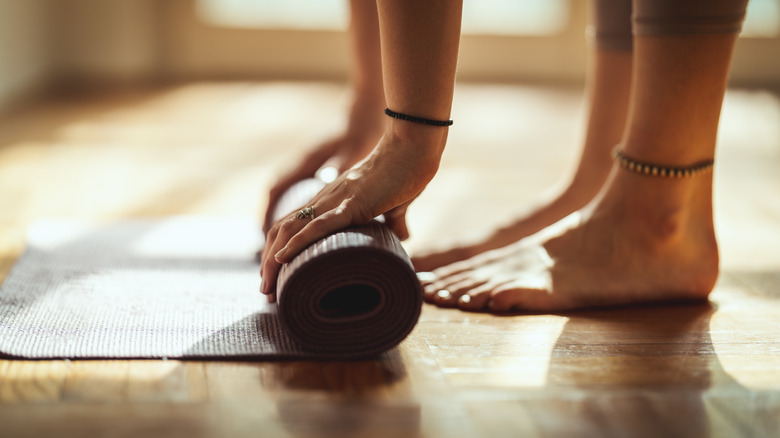 Rolling up a yoga mat