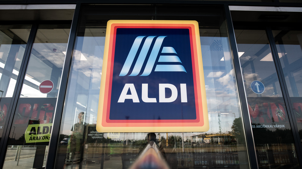 Aldi sign on glass doors.