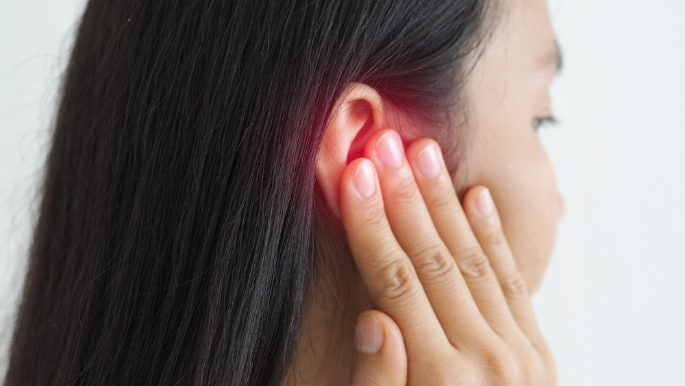 woman with ear pain 