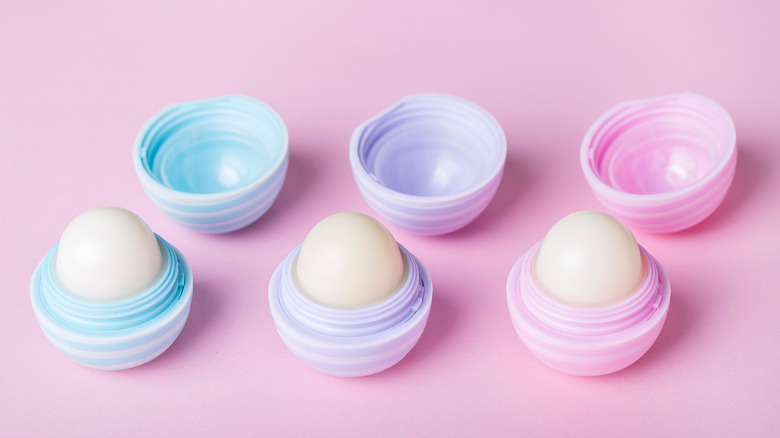 Three pastel eos products sitting in a line