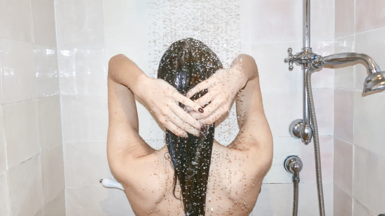 Woman takes a shower