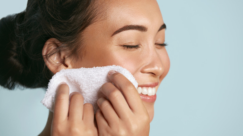 Woman washing face