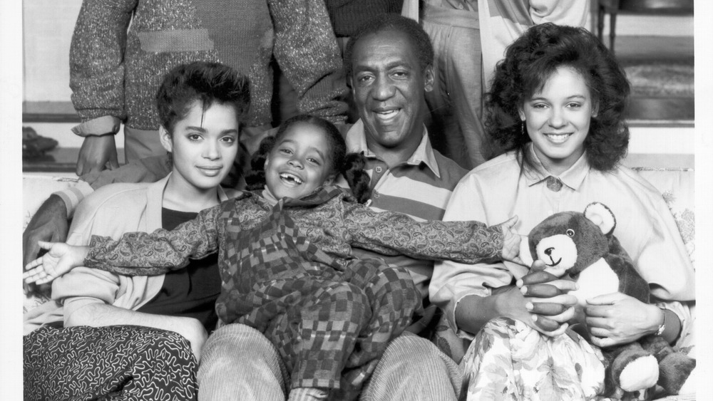 Sabrina Le Beauf sitting with The Cosby Show cast