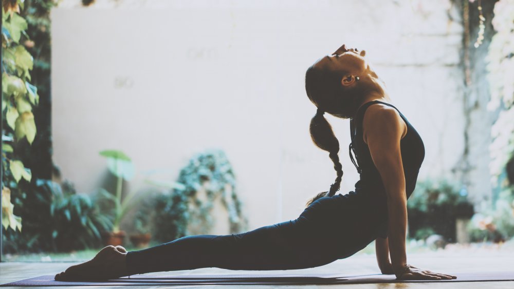 Woman in cobra pose