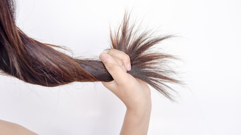 woman twisting her hair