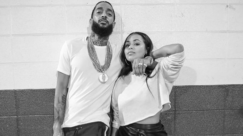 Lauren London posing with Hussle