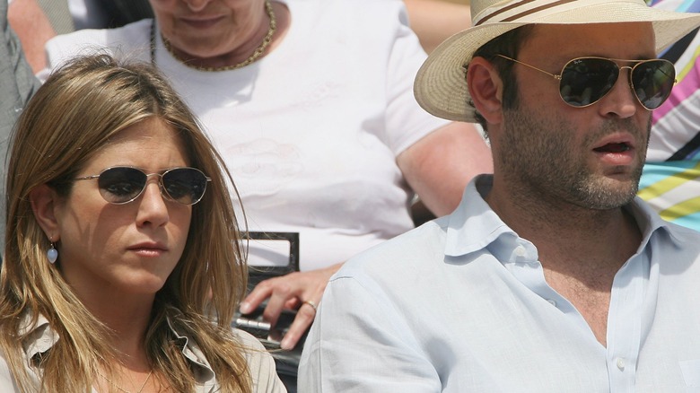 Jennifer Aniston and Vince Vaughn at a tennis match.