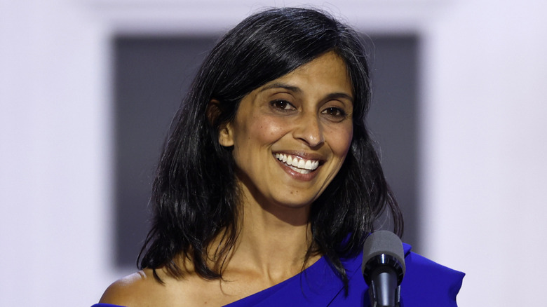 Usha Vance wearing a dark blue dress