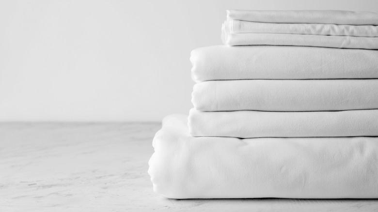 Clean sheets folded on a table 