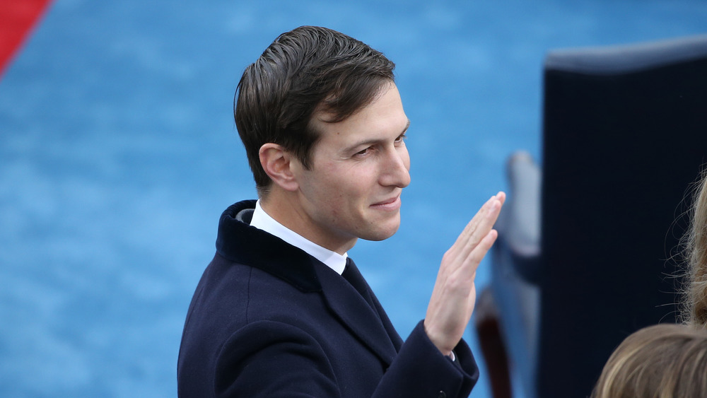 Jared Kushner in navy coat