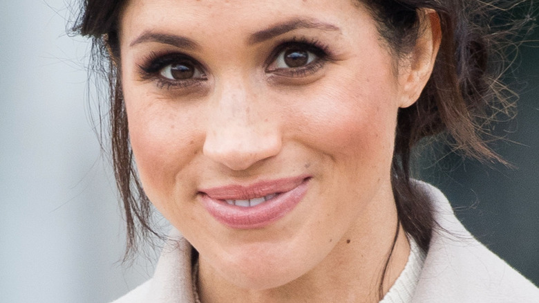 Meghan Markle smiling for photographers 