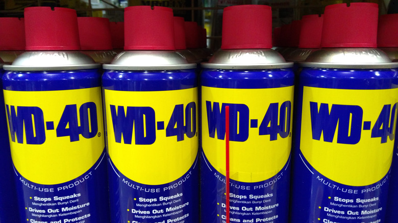 Cans of WD-40 on shelf