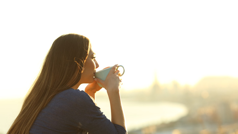 Woman sipping tea