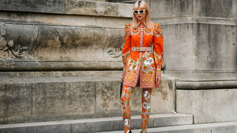 Woman wearing all orange outfit