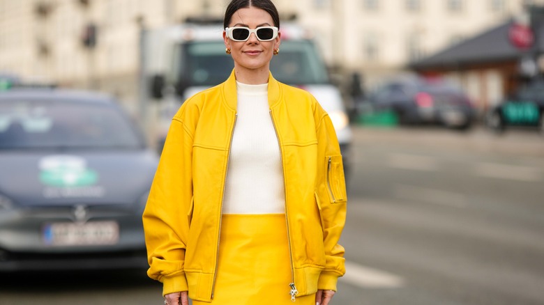 Woman wearing yellow on street