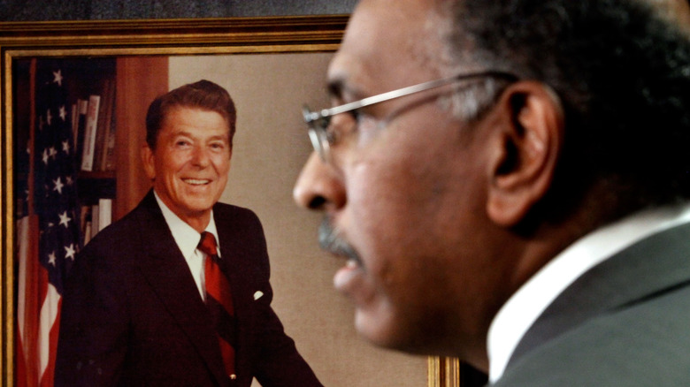 former RNC Chair Michael Steele against the photo of Ronald Reagan