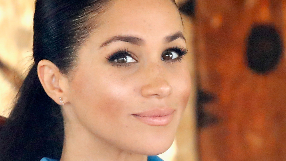 Meghan Markle poses during an interview