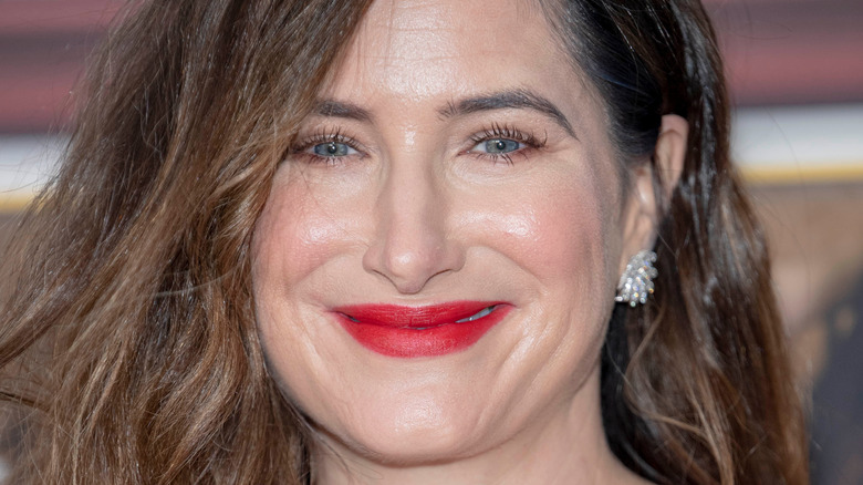 Kathryn Hahn wears red lipstick